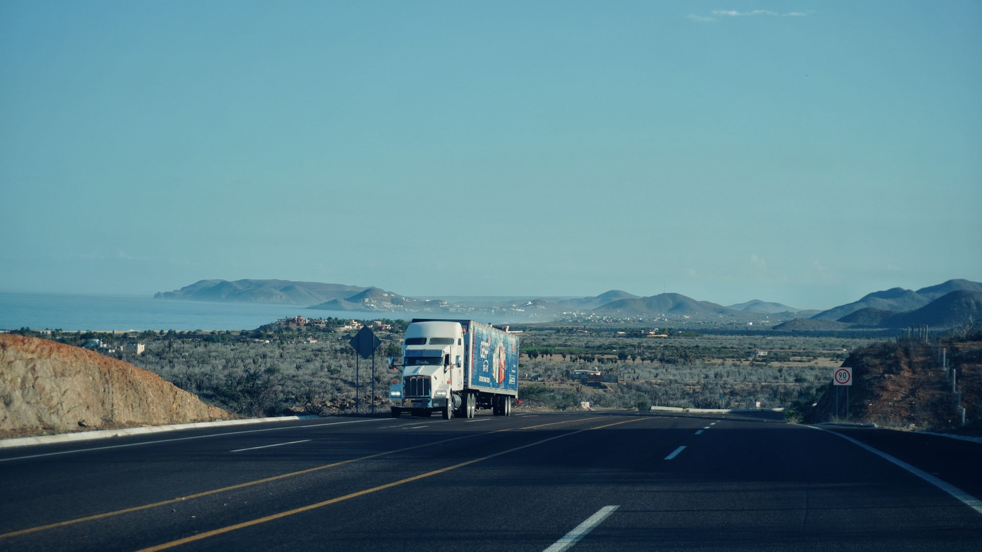 Semi truck on an open mountain highway